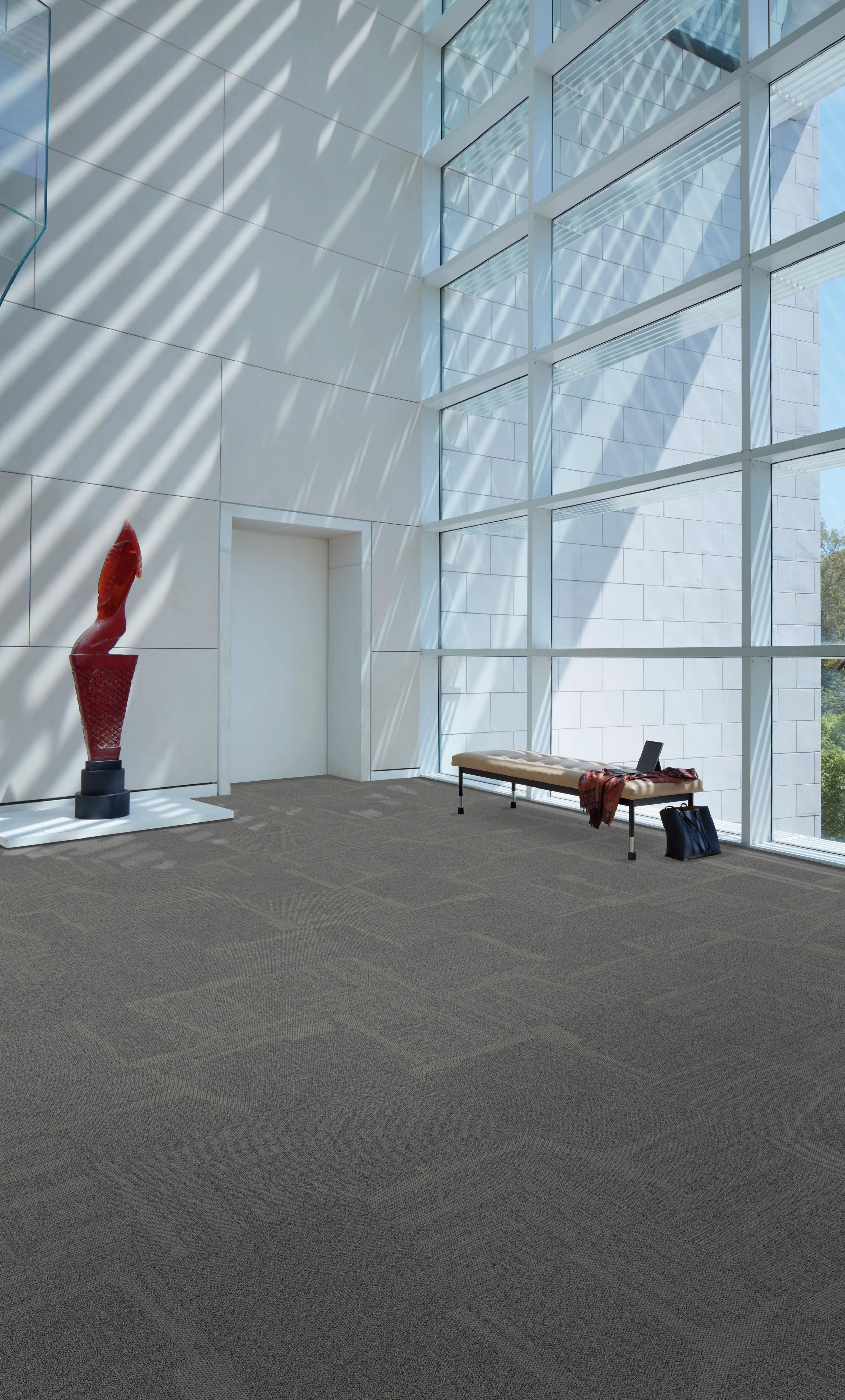 Open Air 441 carpet tile in open room with floor length windows image number 1